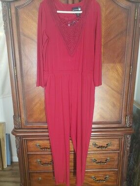 Anthony Originals Red Long Sleeve Jumpsuit w/ A Lace Panel On The Front